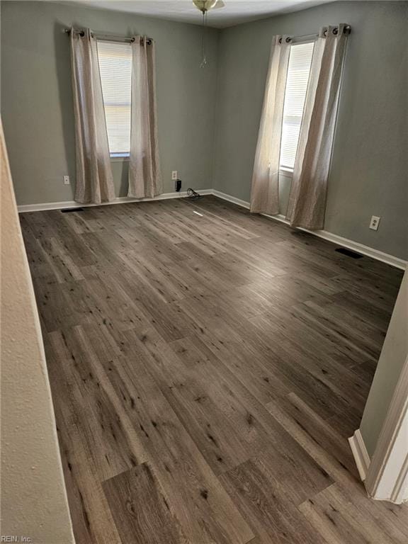 107 Cherry Acres Dr, Hampton, VA 23669 - spare room featuring dark wood-style flooring, baseboards, and a ceiling fan