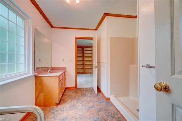 8 Pinckney Ln, Poquoson, VA 23662 - full bath featuring crown molding, a stall shower, vanity, a textured ceiling, and baseboards