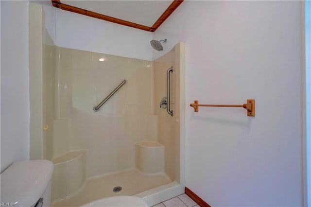 8 Pinckney Ln, Poquoson, VA 23662 - bathroom with toilet, a shower, tile patterned floors, and baseboards