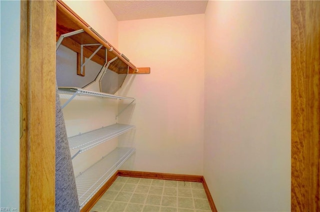 8 Pinckney Ln, Poquoson, VA 23662 - walk in closet with tile patterned floors