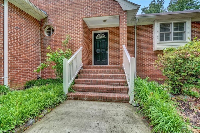 8 Pinckney Ln, Poquoson, VA 23662 - property entrance featuring brick siding