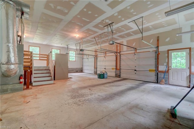 8 Pinckney Ln, Poquoson, VA 23662 - garage featuring a garage door opener