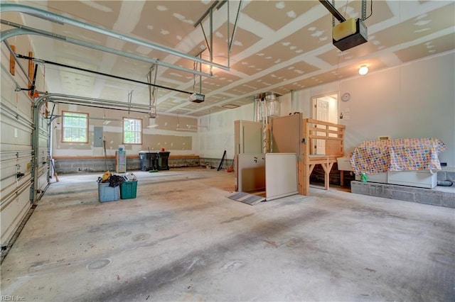 8 Pinckney Ln, Poquoson, VA 23662 - garage featuring a garage door opener and electric panel