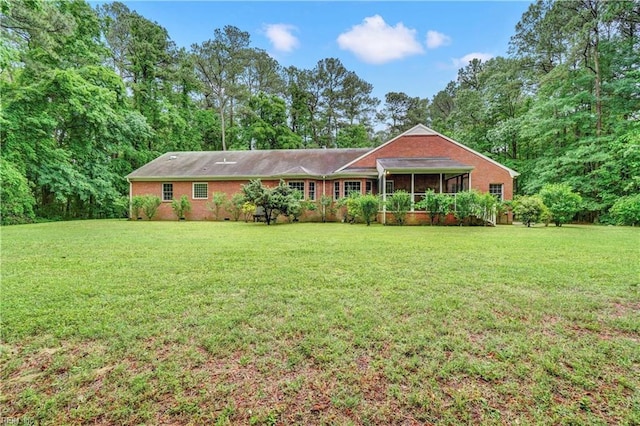 8 Pinckney Ln, Poquoson, VA 23662 - ranch-style home with a front lawn and a sunroom