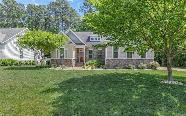 craftsman inspired home featuring stone siding and a front lawn