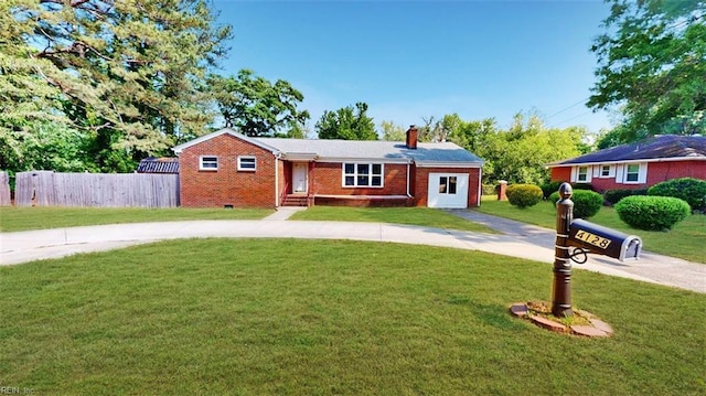 4128 Sunkist Rd, Chesapeake, VA 23321 - single story home featuring brick siding, a chimney, and driveway