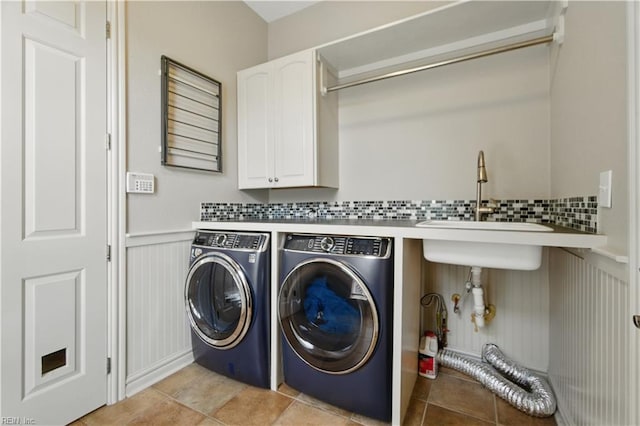 200 Avonlea Dr, Chesapeake, VA 23322 - laundry area featuring cabinet space, wainscoting, and washing machine and clothes dryer