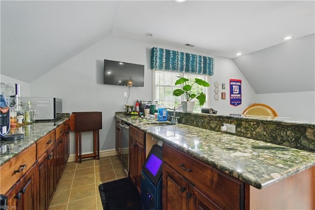 200 Avonlea Dr, Chesapeake, VA 23322 - kitchen featuring a sink, vaulted ceiling, dishwasher, stone counters, and baseboards