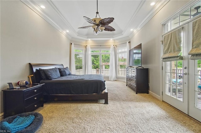 bedroom featuring crown molding, access to outside, carpet flooring, a tray ceiling, and recessed lighting