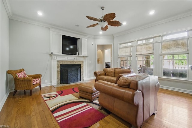 200 Avonlea Dr, Chesapeake, VA 23322 - living area with a ceiling fan, hardwood / wood-style flooring, a fireplace with flush hearth, baseboards, and crown molding