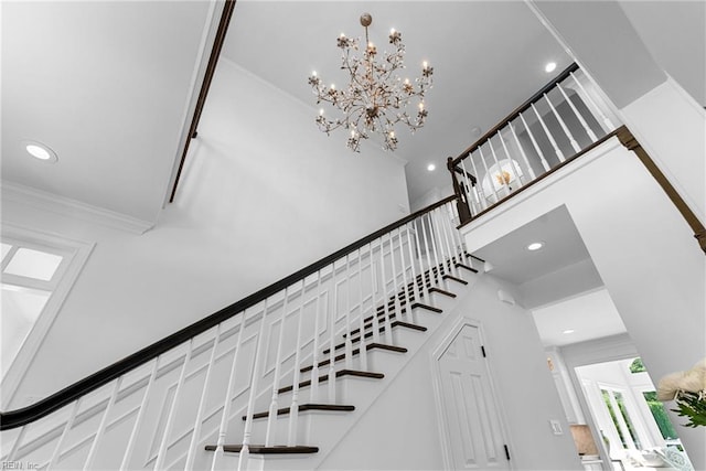 2900 Thomas Smith Ln, Williamsburg, VA 23185 - stairway featuring recessed lighting, a chandelier, ornamental molding, and a towering ceiling