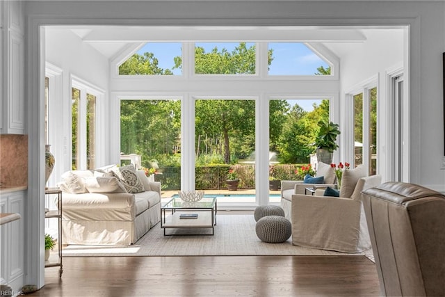 2900 Thomas Smith Ln, Williamsburg, VA 23185 - living room featuring vaulted ceiling, healthy amount of natural light, and wood finished floors