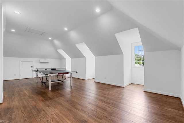 2900 Thomas Smith Ln, Williamsburg, VA 23185 - game room with vaulted ceiling, an AC wall unit, wood finished floors, recessed lighting, and attic access