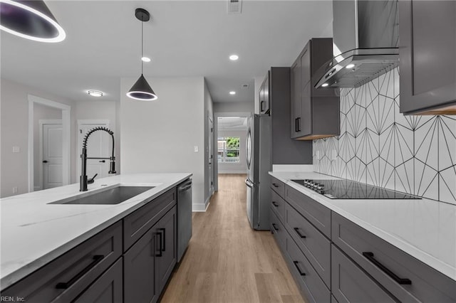 433 Cooper St, Hampton, VA 23669 - kitchen with a sink, wall chimney range hood, appliances with stainless steel finishes, light wood-type flooring, and light countertops
