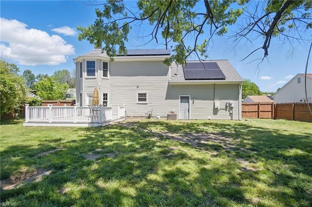 2809 Cedar Cove Ln, Chesapeake, VA 23323 - rear view of property with solar panels and a deck