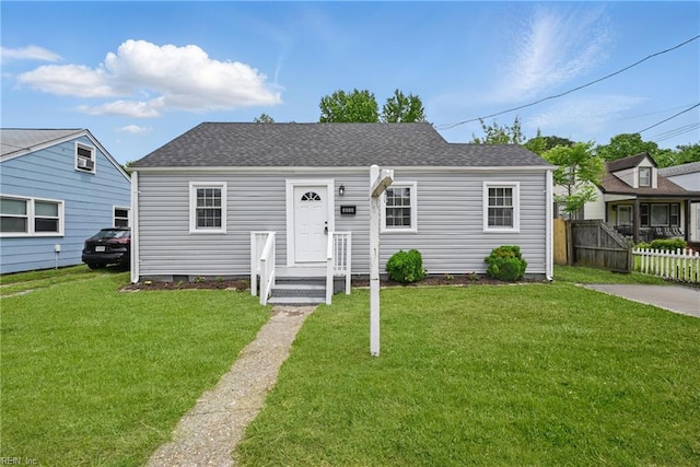 view of front of house with roof with shingles