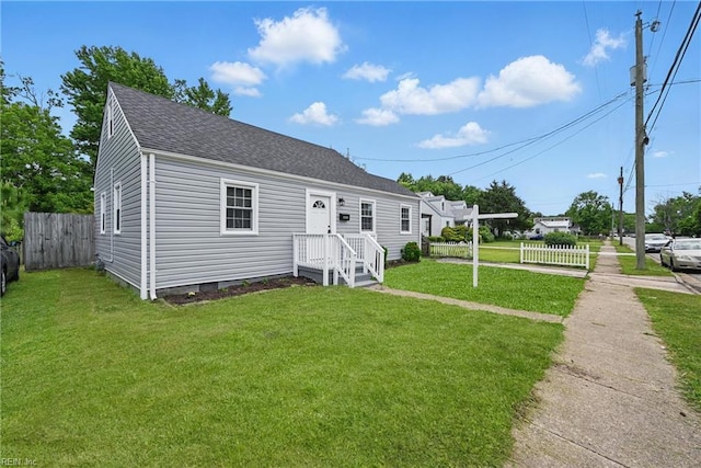 view of front of home with roof with shingles