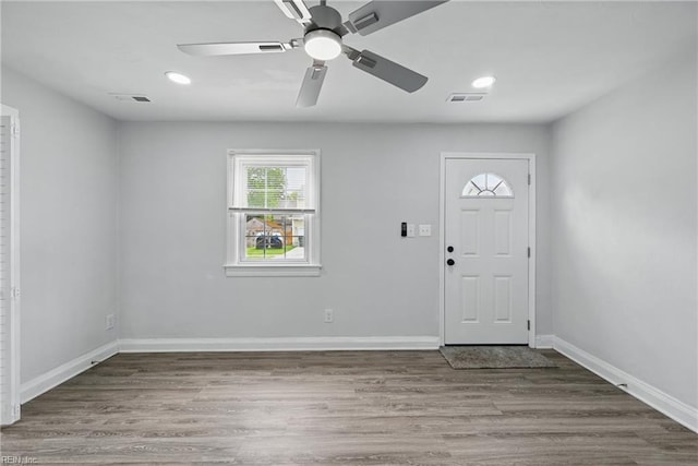 entryway with wood finished floors, a ceiling fan, baseboards, and recessed lighting