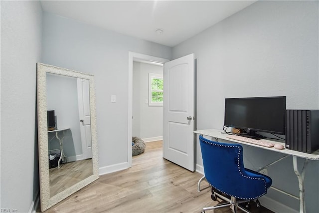 office featuring light wood finished floors and baseboards