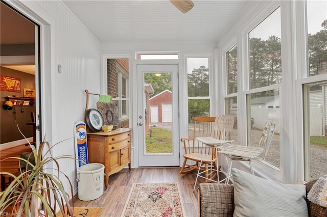 sunroom with wood finished floors