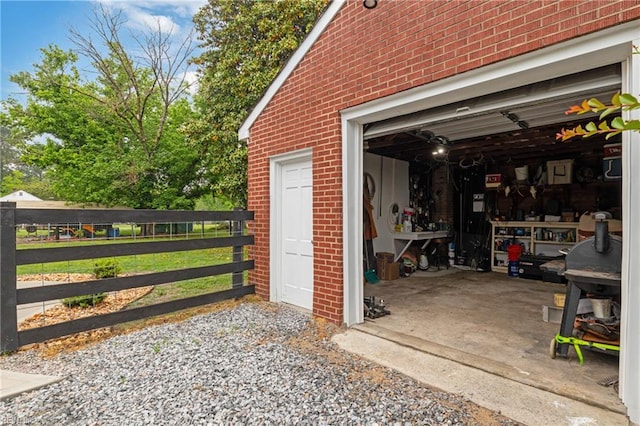 garage featuring fence