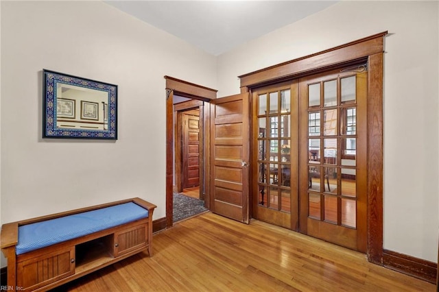 226 Lucile Ave, Norfolk, VA 23504 - doorway with french doors, light wood-style floors, and baseboards