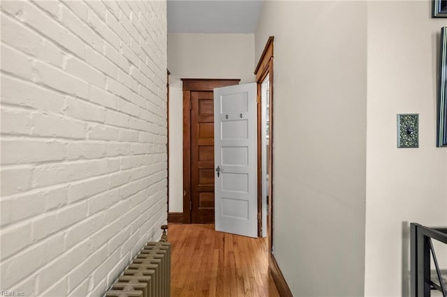 226 Lucile Ave, Norfolk, VA 23504 - hall featuring light wood-style flooring, baseboards, and brick wall
