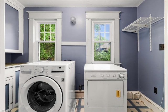 226 Lucile Ave, Norfolk, VA 23504 - washroom with washing machine and dryer, plenty of natural light, tile patterned floors, and baseboards