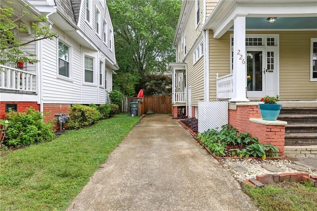 226 Lucile Ave, Norfolk, VA 23504 - property entrance with concrete driveway and covered porch