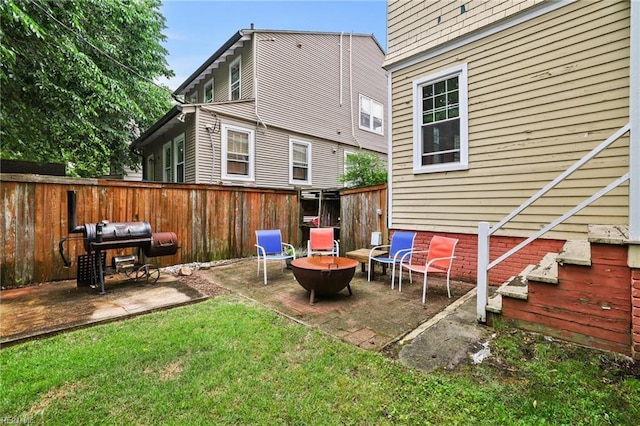 226 Lucile Ave, Norfolk, VA 23504 - back of property with a fire pit and a patio area