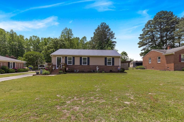 single story home with a front lawn and metal roof