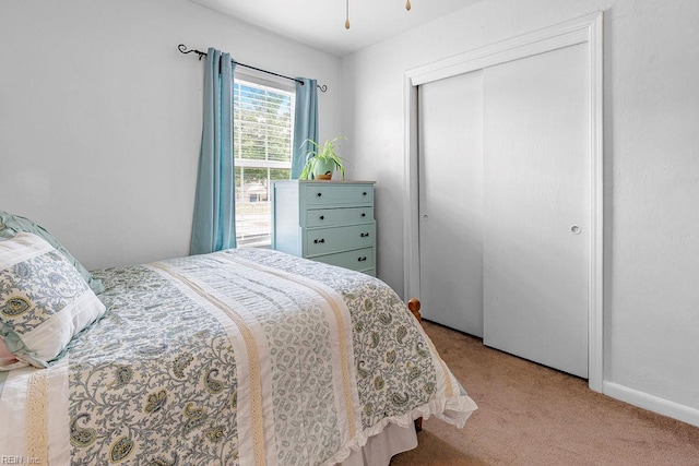 bedroom featuring carpet floors and a closet