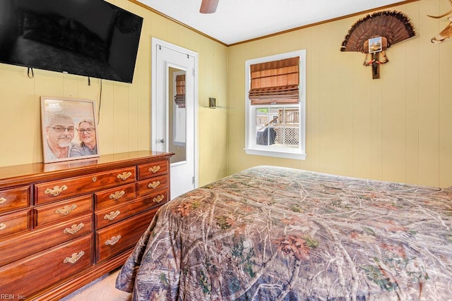 bedroom featuring ornamental molding and ceiling fan
