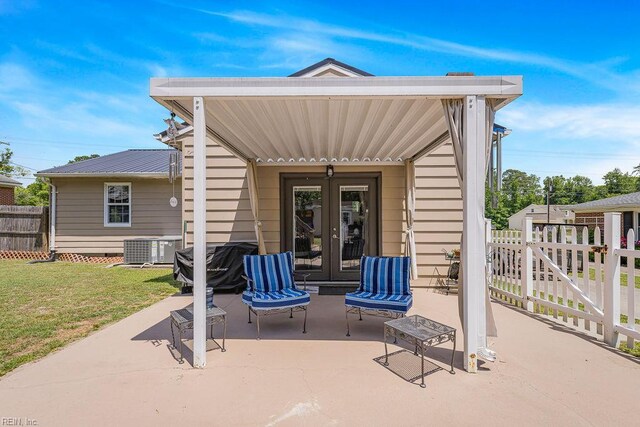 view of patio / terrace with french doors and central AC unit