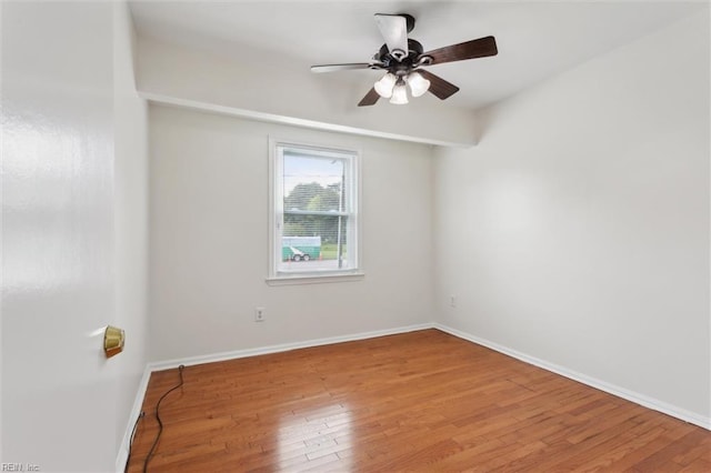 7103 Orcutt Ave, Newport News, VA 23605 - spare room featuring wood finished floors, ceiling fan, and baseboards