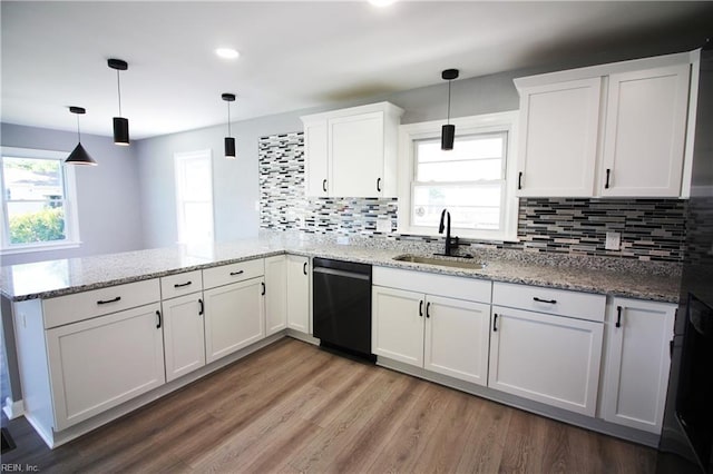 808 Williams Ave, Chesapeake, VA 23323 - kitchen with dishwasher, a sink, a peninsula, white cabinets, and tasteful backsplash