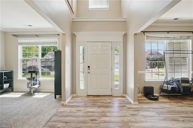 105 Christophers Ln, Hampton, VA 23666 - foyer with wood finished floors, ornamental molding, and baseboards