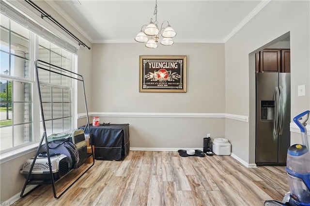 105 Christophers Ln, Hampton, VA 23666 - dining area with a chandelier, ornamental molding, wood finished floors, and baseboards