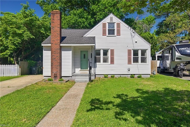 7811 Nesbitt Dr, Norfolk, VA 23505 - view of front of house with a chimney and roof with shingles