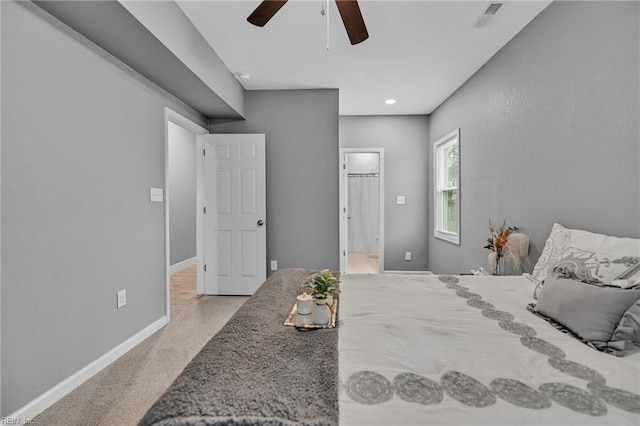 1233 25th St, Newport News, VA 23607 - bedroom with baseboards, ceiling fan, and light carpet