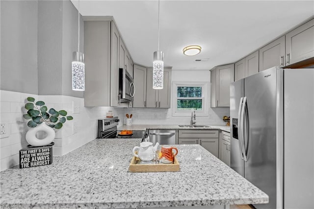 1233 25th St, Newport News, VA 23607 - kitchen with appliances with stainless steel finishes, gray cabinetry, and a sink