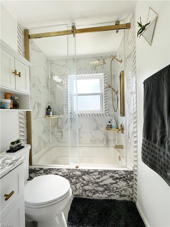 1248 Gladiola Cres, Virginia Beach, VA 23453 - bathroom with bath / shower combo with glass door, toilet, and vanity