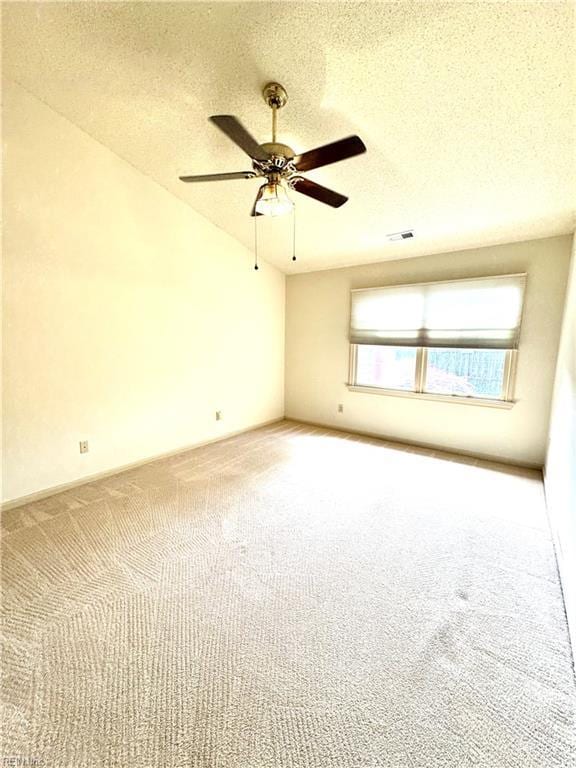 121 Monarch Glade, Yorktown, VA 23692 - empty room featuring carpet, ceiling fan, a textured ceiling, and lofted ceiling