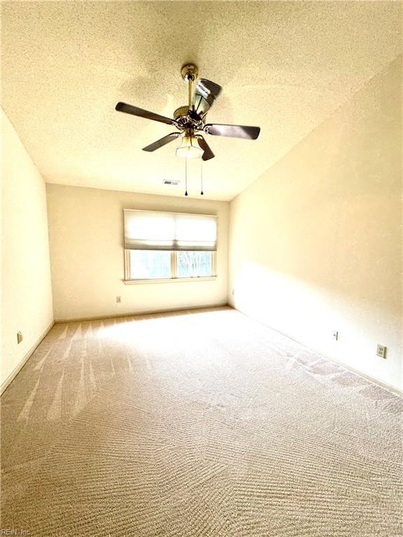 121 Monarch Glade, Yorktown, VA 23692 - carpeted spare room featuring a textured ceiling and ceiling fan