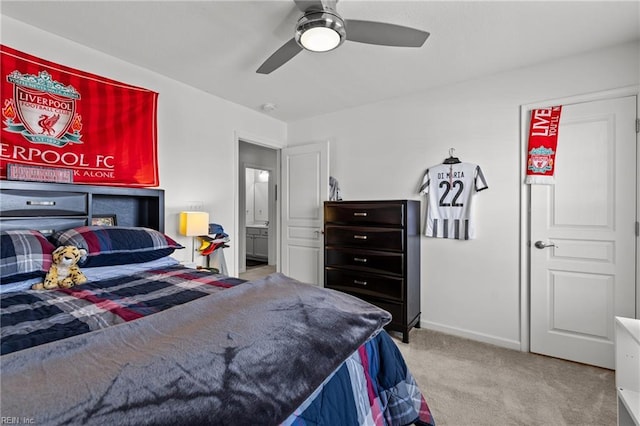carpeted bedroom with baseboards and ceiling fan