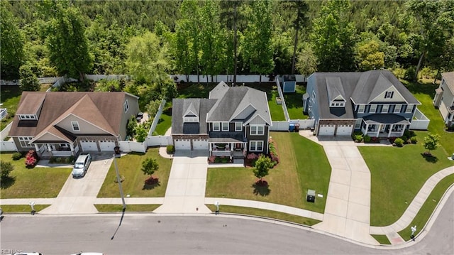 aerial perspective of suburban area featuring a forest