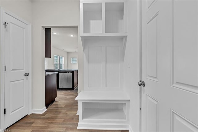 122 American Way, Suffolk, VA 23434 - mudroom featuring wood finished floors, a sink, and baseboards