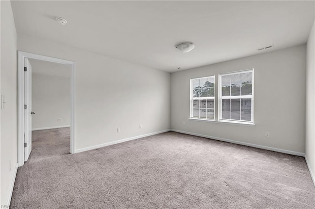 122 American Way, Suffolk, VA 23434 - carpeted spare room with baseboards and a smoke detector