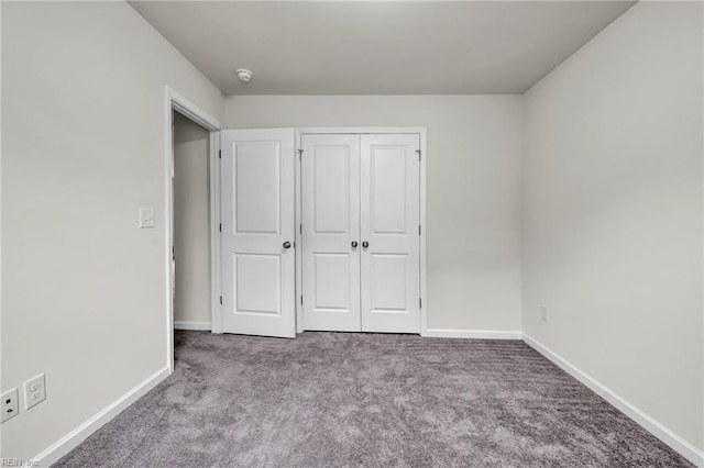 122 American Way, Suffolk, VA 23434 - unfurnished bedroom with carpet floors, baseboards, and a closet