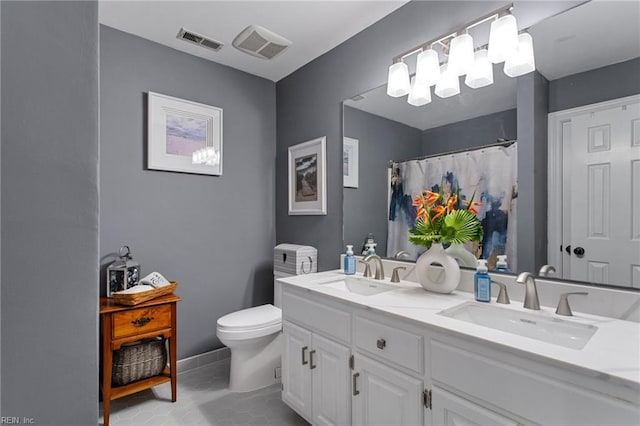 full bath with toilet, tile patterned floors, double vanity, and curtained shower